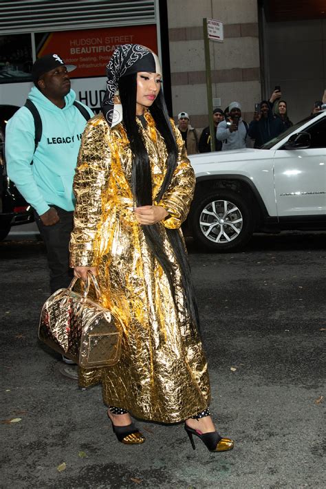 Nicki Minaj Totally Slayed the Coat Game by Wearing Three Eye .